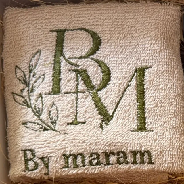 The By Maram monogram, embroidered